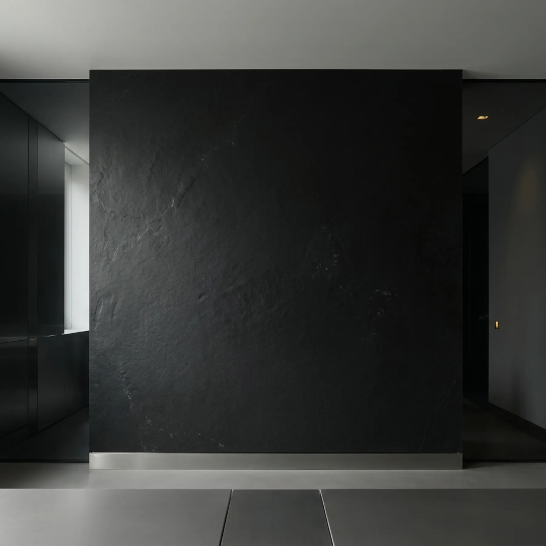 The Caviar Pixels identity on an obsidian studio wall.